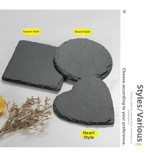 Natural slate coasters in square, round, and heart shapes with rustic raw edges