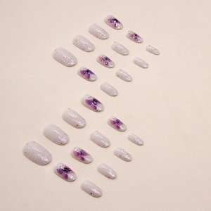 Sparkly purple butterfly press-on nails set with oval shape and glitter finish