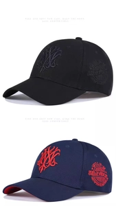 Detailed close-up of high-quality embroidery on black and navy baseball caps