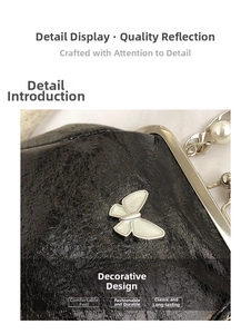 Detail of black wrinkled patent leather bag with silver butterfly and pearl chain