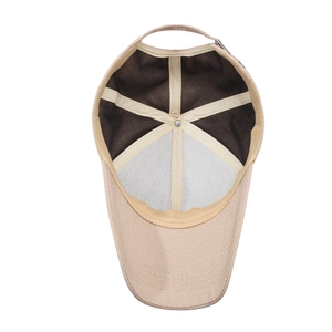 Beige baseball cap interior with contrast lining and adjustable metal buckle