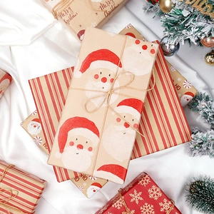 Vintage Kraft Christmas wrapping paper with Santa Claus and snowflake patterns