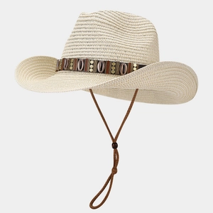 Detail of straw cowboy hat with bohemian shell band and adjustable wind lanyard