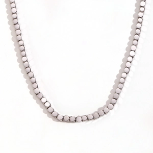 Minimalist silver stainless steel necklace featuring geometric square cube beads
