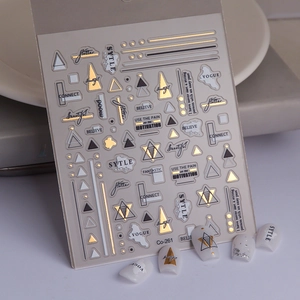 Gold and silver geometric nail stickers with artistic lettering for professional manicure art