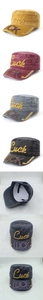 Detail of washed cotton cadet caps with rhinestone Luck letters in four colors