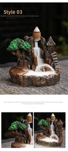 Detail of resin backflow incense burner showing realistic mountain landscape and pine tree
