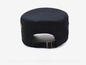 Detail of navy cadet cap back with adjustable bronze metal buckle and cotton texture