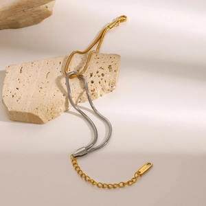 Two-tone gold and silver stainless steel snake chain bracelet with adjustable lobster clasp
