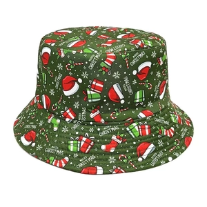 Unisex green Christmas bucket hat with festive patterns and Merry Christmas print