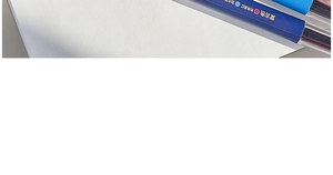 Detail of burgundy red retractable gel pen with matte finish and vintage color series text
