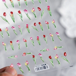 Thin transparent tulip nail art stickers with adhesive backing in colorful floral patterns