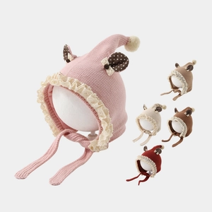 Cute knitted baby winter hat with earflaps and lace trim in five different colors