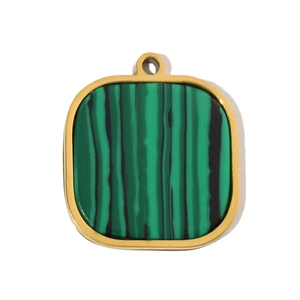 Macro detail of square gold-plated pendant featuring natural striped green malachite stone