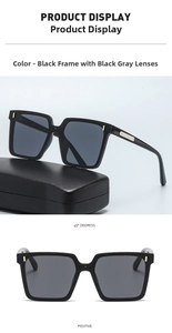 Detail view of square oversized sunglasses with gold metal studs and black frames