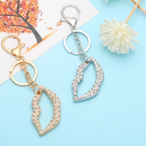 Funkelnder Lippen-Schlüsselanhänger mit Strass in Gold und Silber und Karabinerverschluss