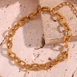 Detail of 18K gold plated stainless steel box chain with lobster clasp and extender