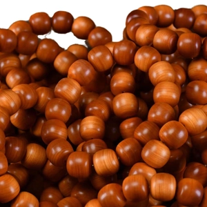 Polished Taihang Cypress wood prayer beads with natural grain and rich amber finish