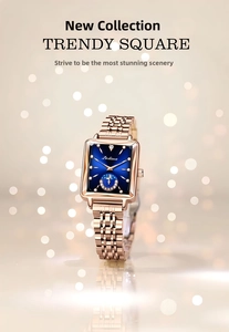 Close-up of square rose gold watch with deep blue sunray dial and crystal hour markers
