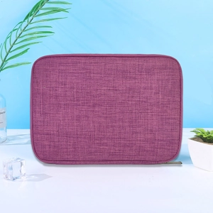 Detail of purple fabric watch strap organizer bag with zipper and textured finish