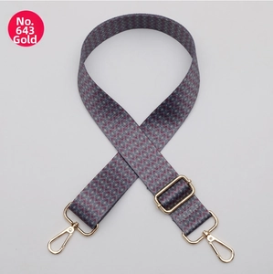 Detail of adjustable geometric weave bag strap model 643 with gold-tone metal hooks