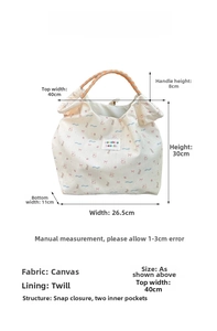 Detailed size chart for the large canvas tote bag with snap buttons and inner pockets