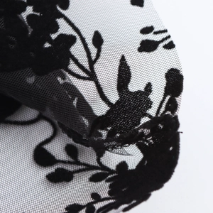French sheer blouse in black mesh with floral flocking detail and lantern sleeves