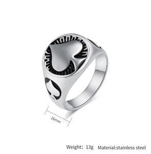 Macro detail of silver stainless steel spade ring with black Ace of Spades emblem