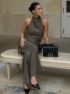 Elegant halter neck satin maxi dress in olive brown with a minimalist A-line silhouette