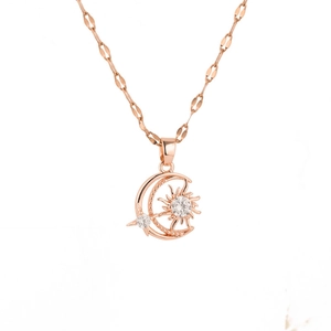 Rose gold stainless steel sun and moon necklace featuring zircon inlaid star pendants