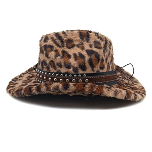 Detailed close-up of leopard print faux fur texture and silver metal studs on cowboy hat