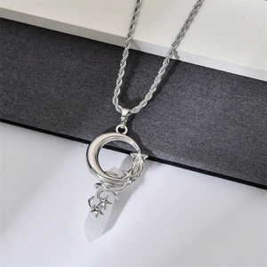 Detail of silver moon and star wire-wrapped white crystal hexagonal pendant necklace