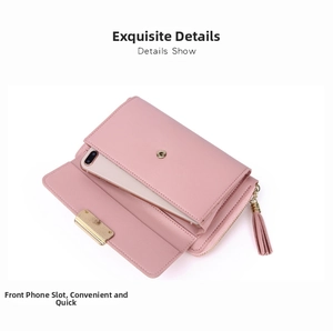 Detail of pink crossbody wallet featuring a dedicated front pocket for smartphone storage
