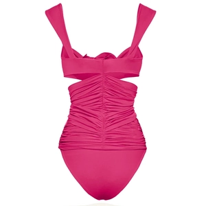 Detail view of pink one-piece swimsuit with ruched texture and open back cutout design