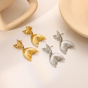 Retro fishtail drop earrings in gold and silver steel with vertical texture finish