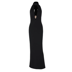 Detail of black halter maxi dress featuring a gold metal buckle on the V-neckline