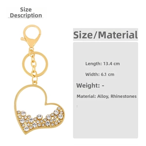 Detailed size specifications for a gold heart keychain with rhinestones and alloy plating