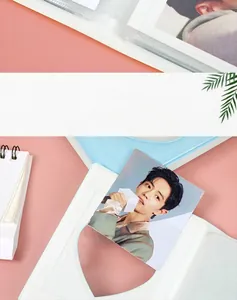 Close-up showing the DIY cover feature of a heart-shaped cutout photo album holder