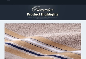 Macro shot of striped cotton towel fabric showing soft terry loop texture and multi-color weave