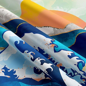Detailed close-up of The Great Wave tapestry fabric texture and vibrant artistic print