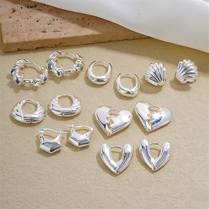 Minimalist silver hollow geometric U-shaped crescent hoop earrings set on stone