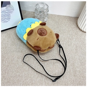 Detail of plush Capybara crossbody bag featuring soft brown fur and blue strap details