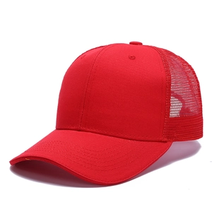 Detail of red mesh trucker hat showing breathable back panels and cotton stitching