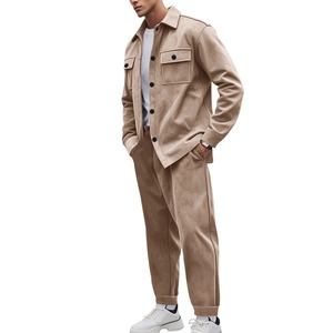 Detail view of khaki faux suede tracksuit showing side profile and black button accents