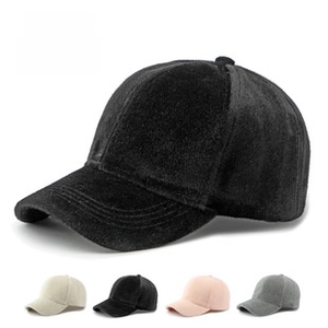 Close-up of velvet baseball cap texture showing premium fabric detail and rich colors