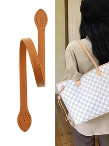 Close-up of brown PU leather shoulder strap replacement with reinforced stitching