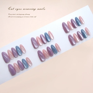 Cat eye press-on nails set with rainbow glass effect in purple pink and teal tones
