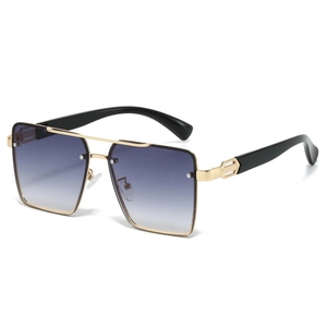 Vintage oversized square sunglasses with gold metal frame and blue gradient lenses