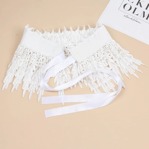 Exquisite white lace belt featuring embroidery and satin ties shown in detail from a top view