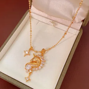 18k gold plated unicorn pendant necklace with sparkling cubic zirconia in a jewelry box